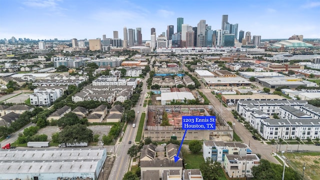 birds eye view of property with a city view