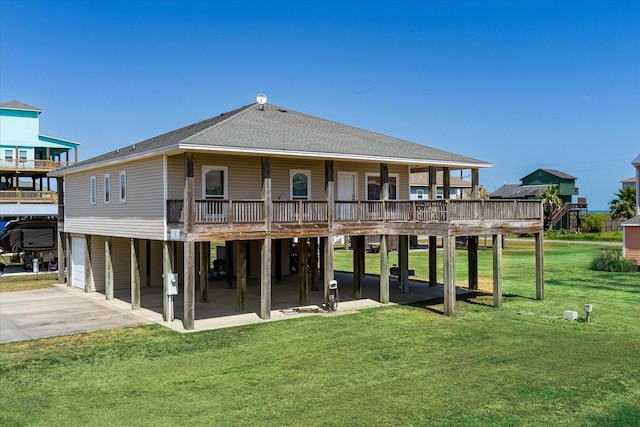 138 Verdia Dr, Crystal Beach, TX 77650 - back of house with a deck, a yard, driveway, and a patio area