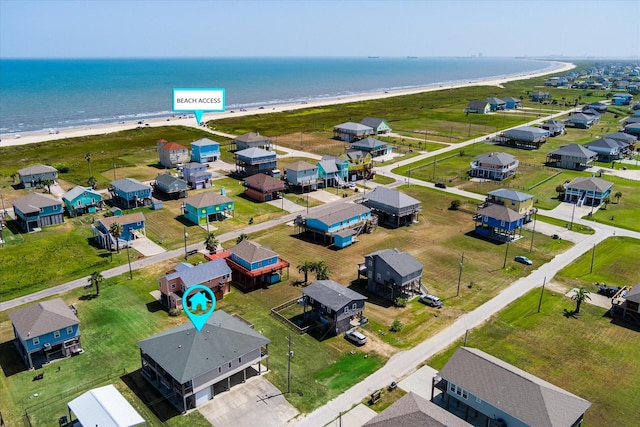 138 Verdia Dr, Crystal Beach, TX 77650 - aerial view featuring a beach view, a residential view, and a water view