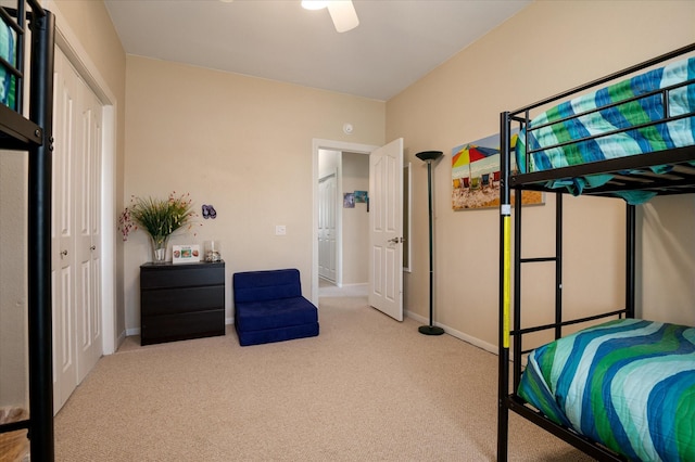 138 Verdia Dr, Crystal Beach, TX 77650 - carpeted bedroom featuring baseboards, a ceiling fan, and a closet
