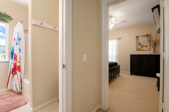 138 Verdia Dr, Crystal Beach, TX 77650 - interior space with baseboards, ceiling fan, and plenty of natural light