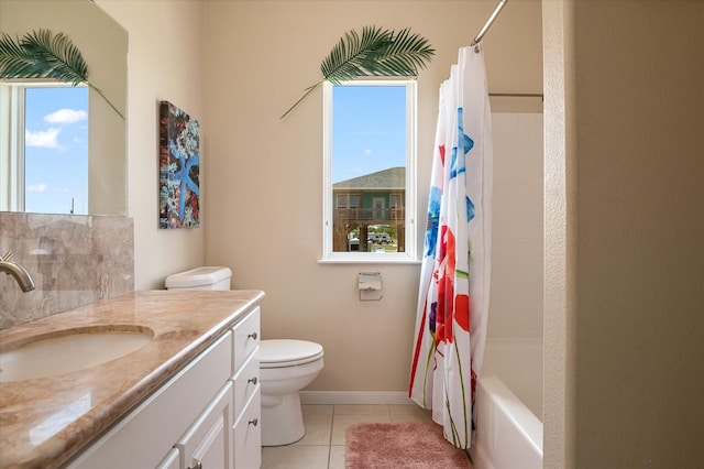 138 Verdia Dr, Crystal Beach, TX 77650 - bathroom featuring toilet, tile patterned flooring, vanity, and plenty of natural light
