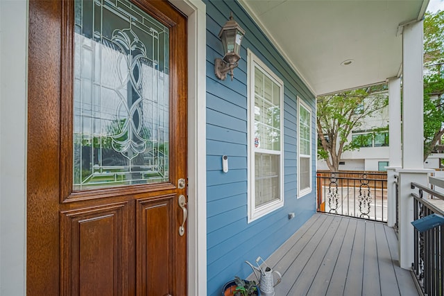 wooden deck featuring a porch