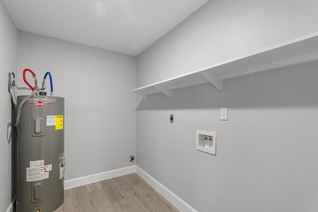 laundry room with laundry area, hookup for a washing machine, electric water heater, light wood-style flooring, and hookup for an electric dryer