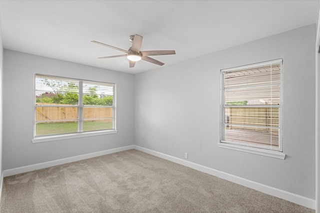 5429 De Lange Ln, Houston, TX 77092 - carpeted empty room featuring ceiling fan and baseboards