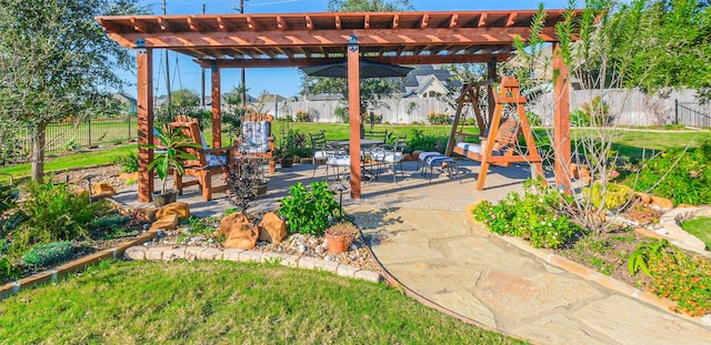 view of patio / terrace featuring a pergola and a fenced backyard
