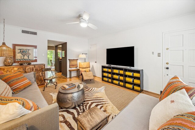1800 Stoney Brook Dr Unit 105, Houston, TX 77063 - living area featuring ceiling fan, visible vents, and wood finished floors