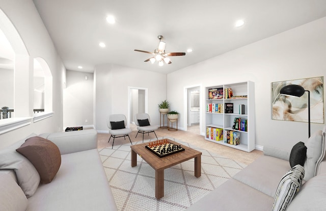 10719 Jacobina Ct, Cypress, TX 77433 - living area featuring recessed lighting, a ceiling fan, baseboards, arched walkways, and light colored carpet