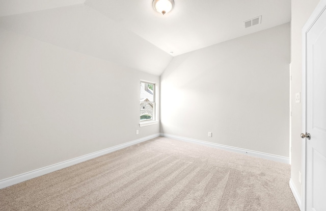 10719 Jacobina Ct, Cypress, TX 77433 - spare room with visible vents, vaulted ceiling, carpet floors, and baseboards