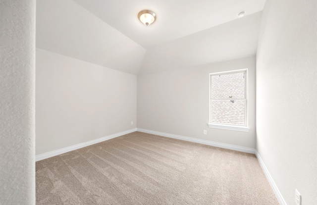 10719 Jacobina Ct, Cypress, TX 77433 - carpeted spare room featuring vaulted ceiling and baseboards