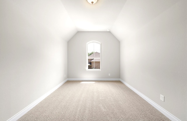 10719 Jacobina Ct, Cypress, TX 77433 - bonus room featuring baseboards, light carpet, and lofted ceiling