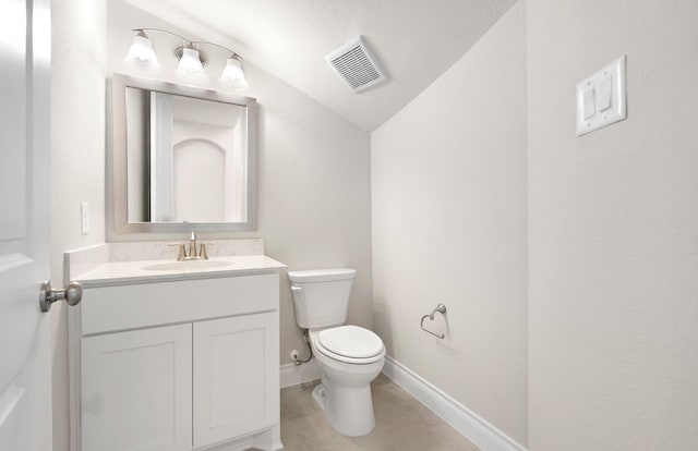 10719 Jacobina Ct, Cypress, TX 77433 - half bath with vanity, toilet, visible vents, tile patterned flooring, and lofted ceiling