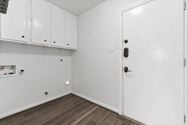 washroom featuring hookup for an electric dryer, cabinet space, hookup for a gas dryer, dark wood-type flooring, and hookup for a washing machine