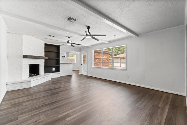 unfurnished living room with dark wood-style floors, a ceiling fan, visible vents, baseboards, and a textured ceiling