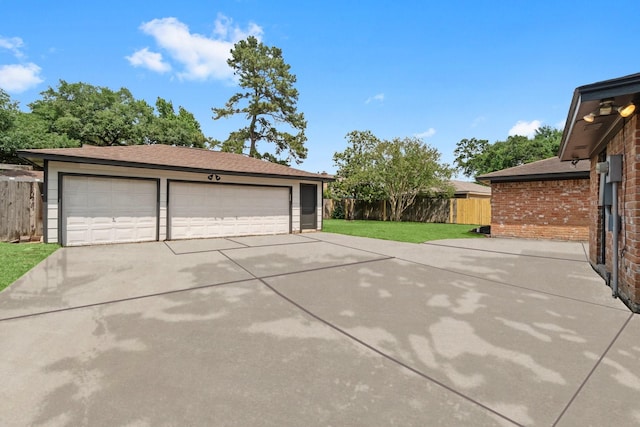 detached garage with fence