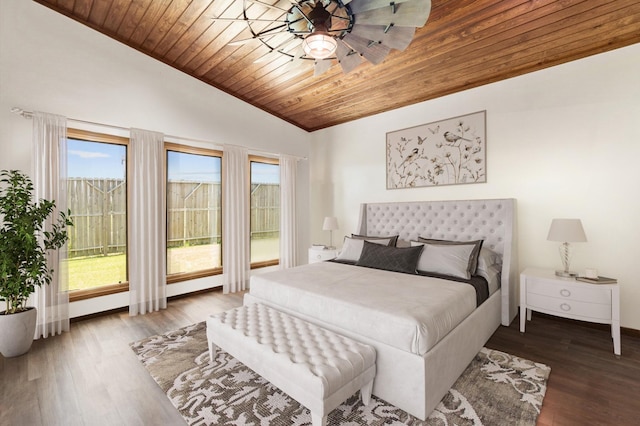 11008 Hillside Dr, Willis, TX 77318 - bedroom featuring baseboards, vaulted ceiling, wood ceiling, and wood finished floors