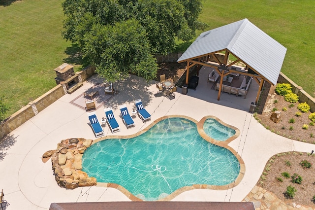 11008 Hillside Dr, Willis, TX 77318 - view of pool featuring a lawn, a fenced in pool, a gazebo, and a patio area