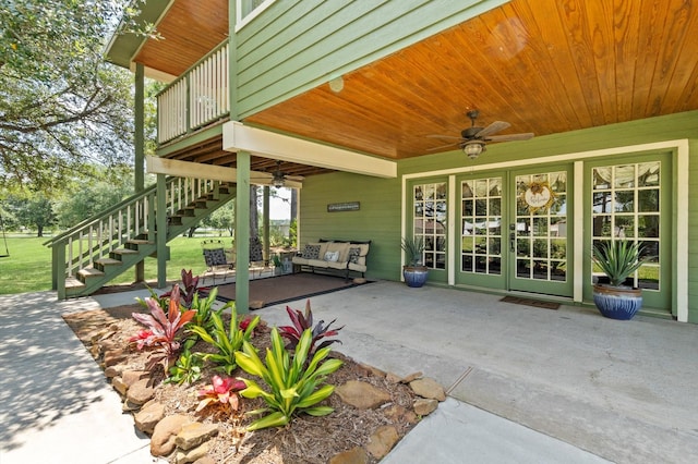 11008 Hillside Dr, Willis, TX 77318 - view of patio / terrace with a ceiling fan and stairs