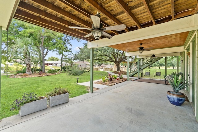 11008 Hillside Dr, Willis, TX 77318 - view of patio / terrace with a ceiling fan and stairway