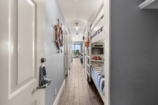 corridor with wood finished floors