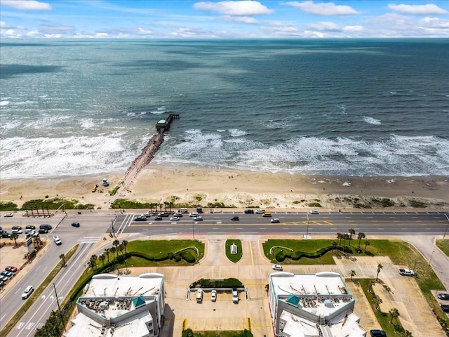 aerial view featuring a water view and a view of the beach