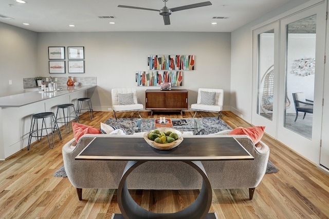 rec room with visible vents, a ceiling fan, recessed lighting, and light wood-style floors