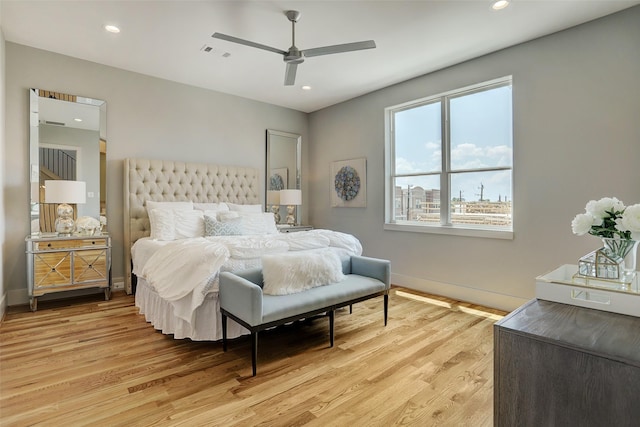 bedroom featuring recessed lighting, ceiling fan, light wood finished floors, baseboards, and visible vents