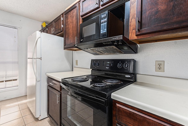 kitchen featuring light tile patterned floors, a textured ceiling, light countertops, dark brown cabinetry, and black appliances