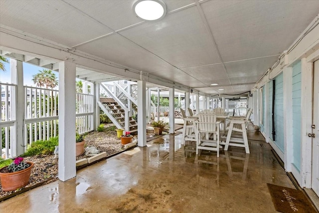 4311 Spanish Main, Jamaica Beach, TX 77554 - sunroom with concrete flooring and a healthy amount of sunlight
