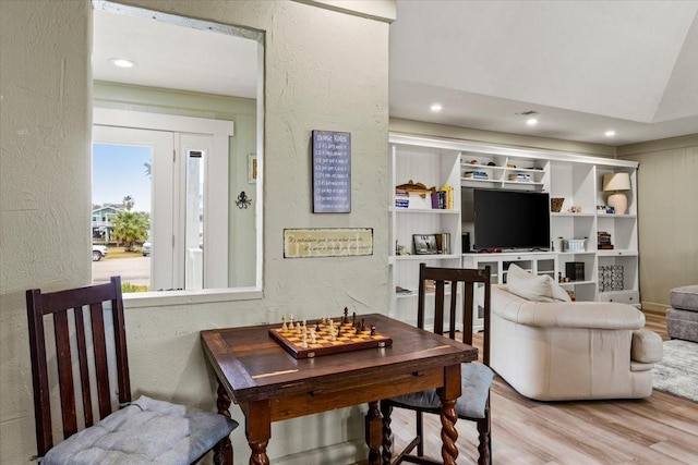 4311 Spanish Main, Jamaica Beach, TX 77554 - interior space featuring recessed lighting, wood finished floors, and a textured wall