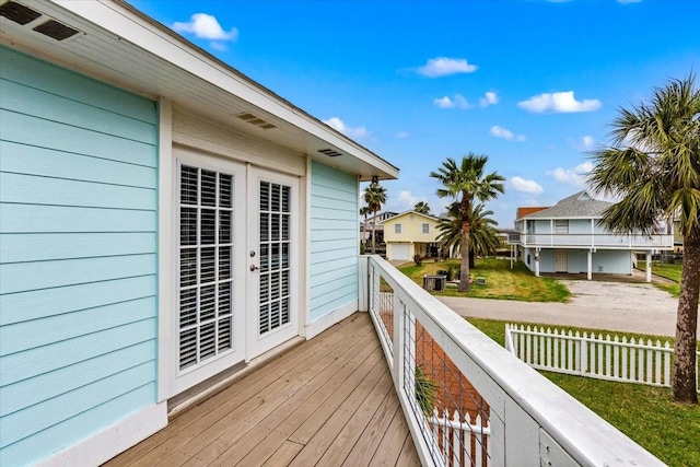 4311 Spanish Main, Jamaica Beach, TX 77554 - wooden terrace with a residential view