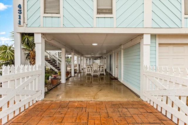 4311 Spanish Main, Jamaica Beach, TX 77554 - view of patio featuring stairway and fence