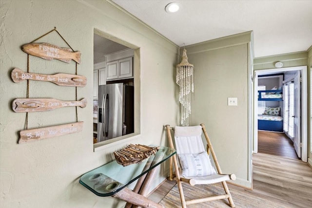 4311 Spanish Main, Jamaica Beach, TX 77554 - corridor featuring crown molding, light wood finished floors, and baseboards