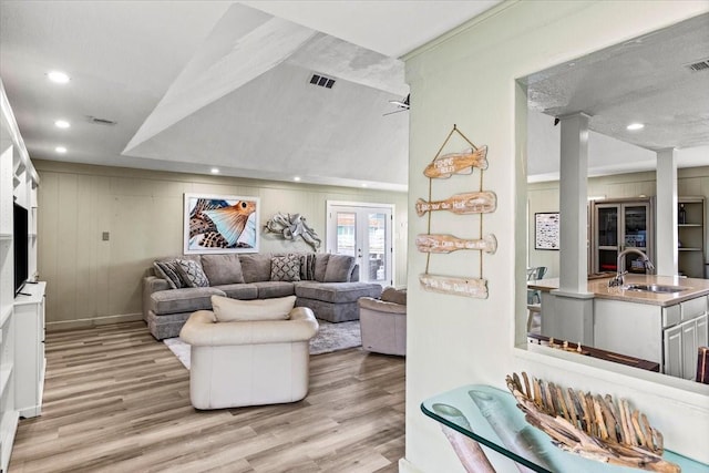 4311 Spanish Main, Jamaica Beach, TX 77554 - living room with recessed lighting, visible vents, and light wood-style flooring