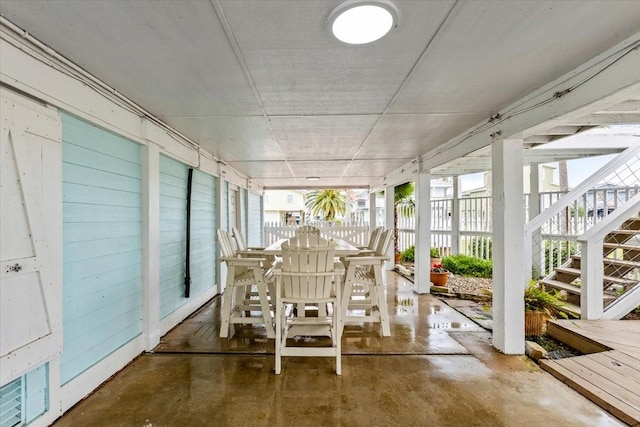 4311 Spanish Main, Jamaica Beach, TX 77554 - sunroom / solarium featuring unfinished concrete flooring