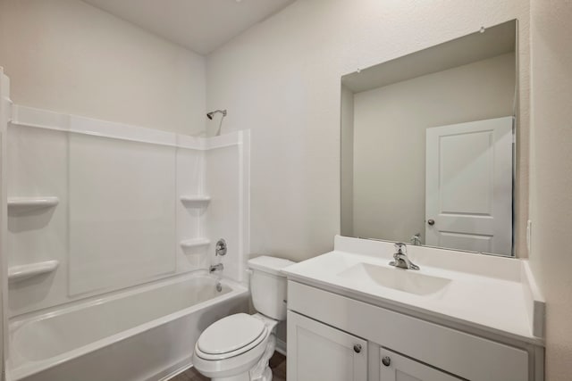 bathroom with shower / bathing tub combination, toilet, and vanity