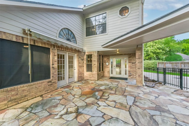 view of patio with fence and french doors