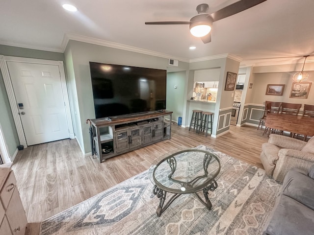 3300 Pebblebrook Dr Unit 19, Seabrook, TX 77586 - living area with recessed lighting, baseboards, ornamental molding, light wood finished floors, and ceiling fan