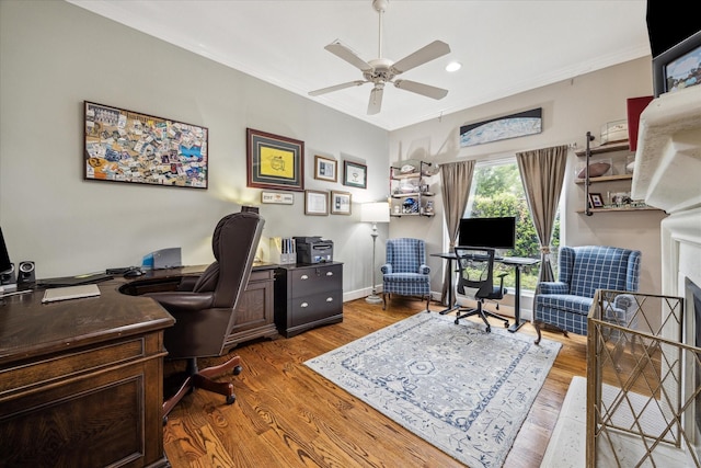 home office with recessed lighting, a ceiling fan, wood finished floors, and ornamental molding