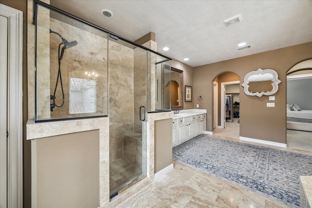 full bath with visible vents, recessed lighting, vanity, and a shower stall