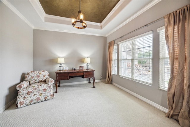 living area with a tray ceiling, a chandelier, baseboards, and carpet