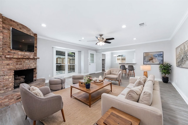 5807 Dumfries Dr, Houston, TX 77096 - living area featuring visible vents, a healthy amount of sunlight, wood finished floors, and baseboards