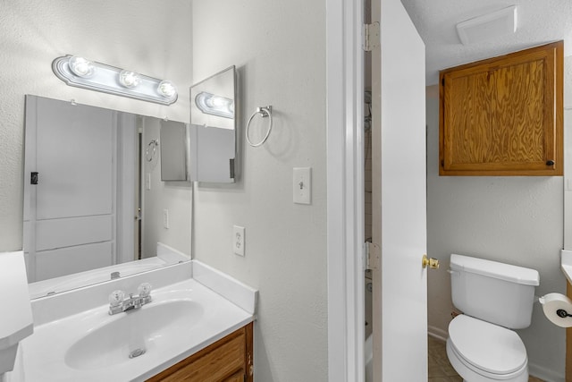bathroom featuring toilet, tile patterned flooring, visible vents, and vanity