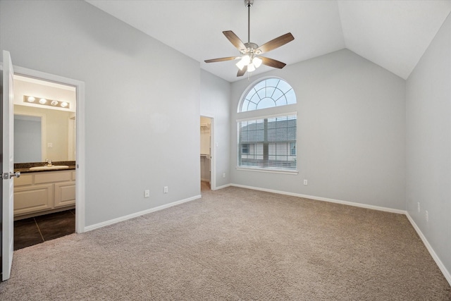 1339 Ella Pl, Houston, TX 77008 - unfurnished bedroom featuring vaulted ceiling, carpet floors, a spacious closet, connected bathroom, and ceiling fan