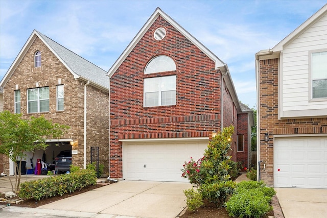 1339 Ella Pl, Houston, TX 77008 - view of front of house with an attached garage, concrete driveway, and brick siding
