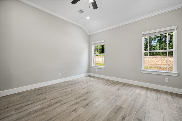 unfurnished room with light wood-style flooring, ornamental molding, baseboards, visible vents, and a ceiling fan