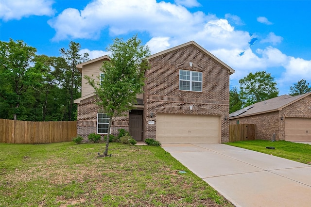 traditional-style house with a garage, brick siding, fence, and a front yard