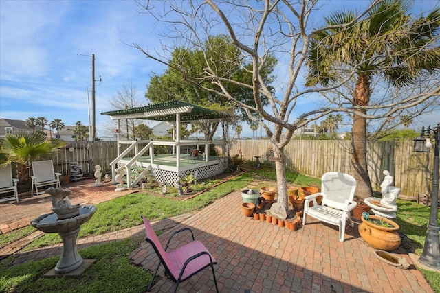 24 Clara Barton Ln, Galveston, TX 77551 - view of patio with a wooden deck
