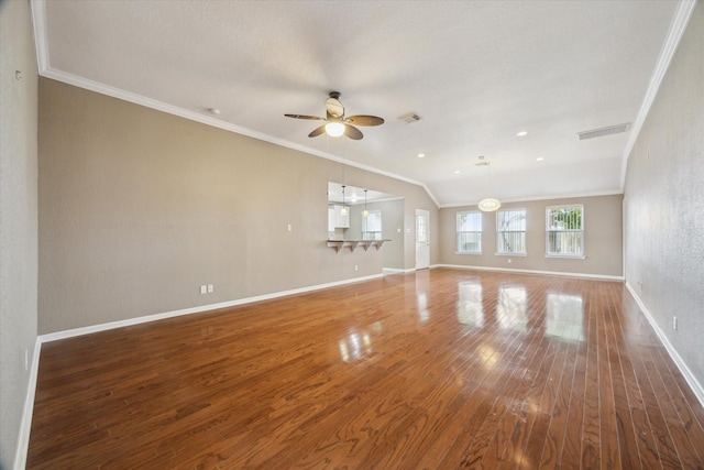 24 Clara Barton Ln, Galveston, TX 77551 - unfurnished living room featuring a ceiling fan, crown molding, wood finished floors, and baseboards