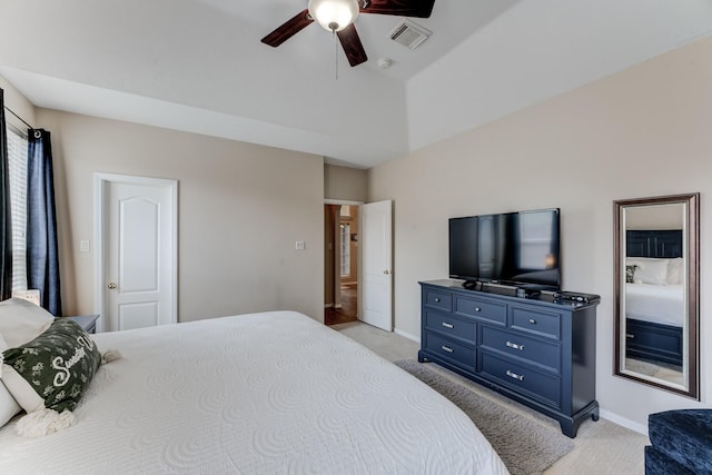 bedroom with light colored carpet, visible vents, and baseboards
